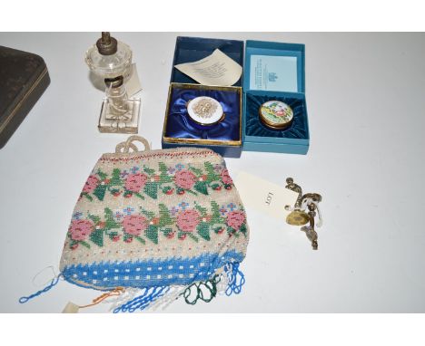 A pair of Dickensian character pipe tampers; a cut glass table lighter; a bead pattern bag; and a Halcyon Days patch box.