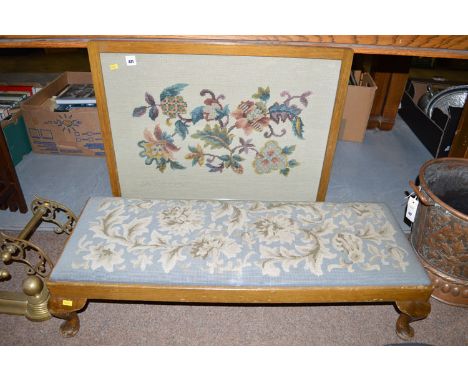 A fire screen with tapestry panel; together with a stool with tapestry drop in seat and cabriole feet.