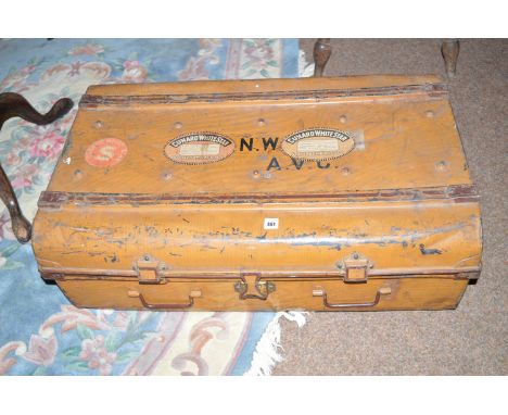An early 20th Century scumble painted tin trunk, stencilled initials and "Cunard White Star", labels attached, for The Queen 