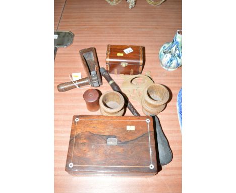 A Victorian wooden bird scarer; a turned yew wood needle case and cover; a rosewood box with sewing implements; another box a