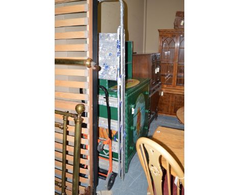 A set of folding aluminium step ladders; and a sack barrow.