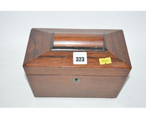 A small Victorian rosewood sarcophagus-shaped tea caddy opening to reveal two compartments with lids.