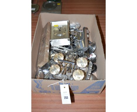 Plated ware to include: an egg cruet set; a H. Samuel quartz carriage clock; flatware; salt pig; etc.