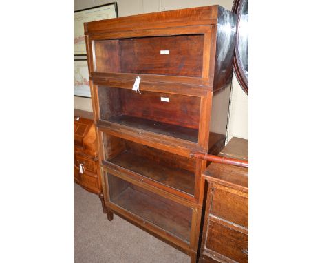 An early 20th Century mahogany Globe-Wernicke universal elastic bookcase with label to back of top section, four sections rai