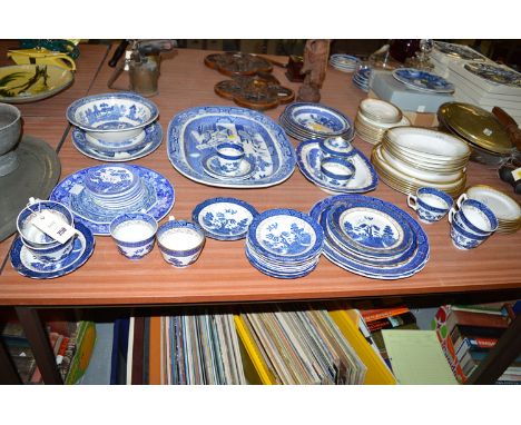 A Royal Albert "Athena" part dinner service with gilt decoration; a "Real Old Willow" part tea and dinner service; together w