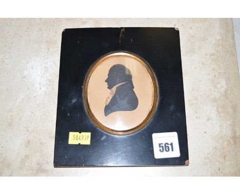 A 19th Century silhouette - Portrait of a gentleman, ink on paper.