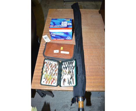 A collection of large modern salmon flies in a snowbee, model no. 100 fly box; and another wallet containing salmon and trout