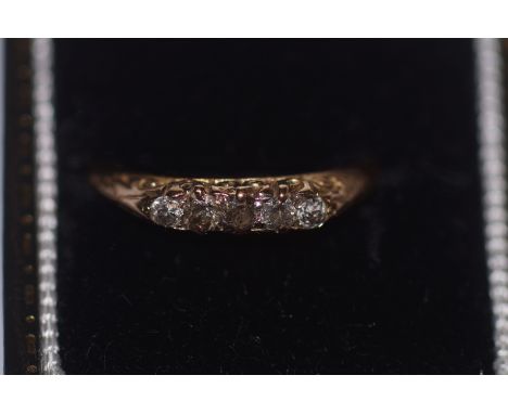 Yellow metal ring set with 5 good quality diamonds Size P