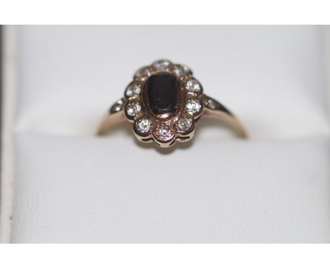 9ct Gold ring set with sapphire &amp; clear stones