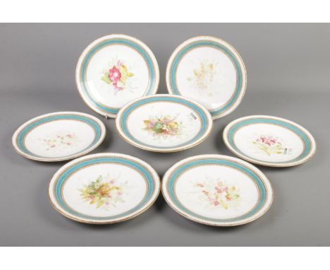 A Royal Worcester part dessert service with hand painted floral decoration.  Damage to foot of comport. Fading to decoration.