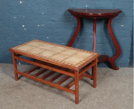 A teak tile top coffee table along with a hardwood side table.  