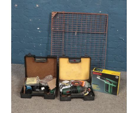 A quantity of assorted tools to include Bosch examples such as sander and heat gun.  