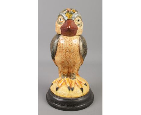 A ceramic jar formed as a grotesque bird in the style of Martin Brothers. 24.5cm.  