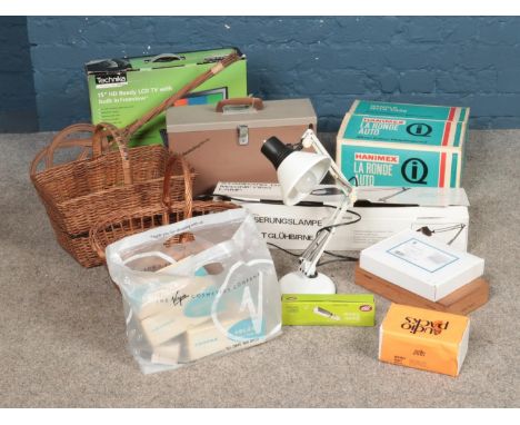 A collection of assorted items to include wicker baskets, magnifying lamp, colour slide projector and angle poise lamp.  