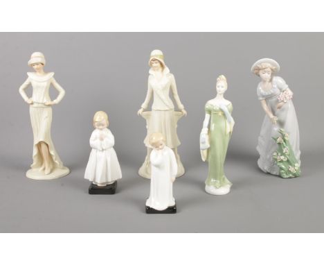 A collection of ceramic figures, including Regal and Royal Doulton examples.  Repairs to Royal Doulton Lorna and Bedtime figu