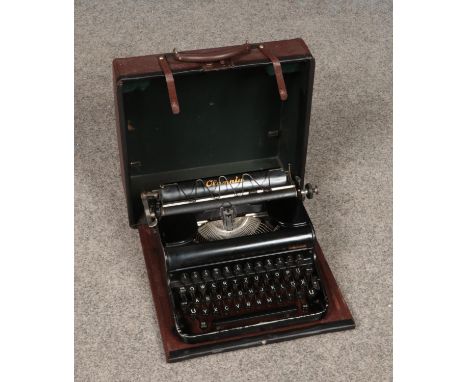 A vintage Olympia Elite typewriter.  