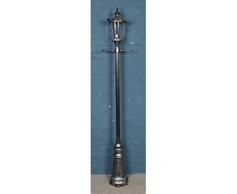 A Victorian style lamp post.  