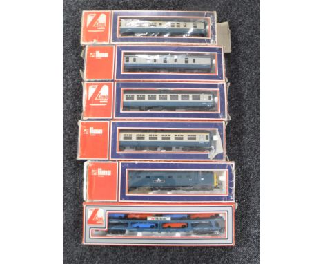 A box containing a boxed Lima The Fife and Forfar Yeomanry diesel engine together with four carriages and a boxed car transpo