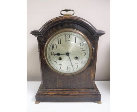 An oak cased Junghans mantel clock