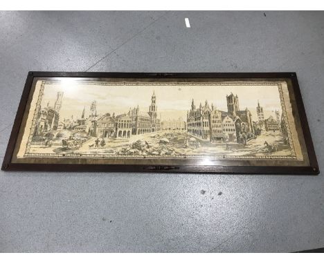An antique oak framed tapestry depicting Brussels 