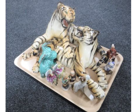 A tray containing a large china figure of fighting tigers together with two Melba ware terriers, Goebel figure etc