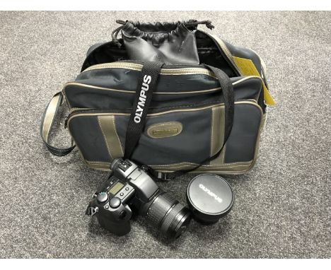 An Olympus E-20p 5.0 megapixel digital camera in case with accessories
