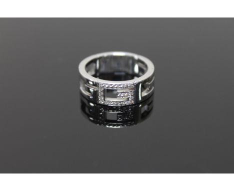 An 18ct gold diamond set ring by Gucci, 10.2g, (Cost £1,100 new) CONDITION REPORT: Size R. 