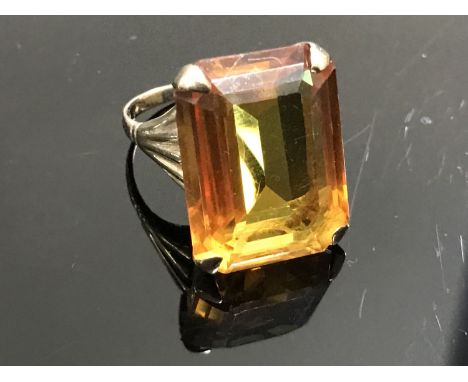 A 9ct gold ring set with a large citrine, size M