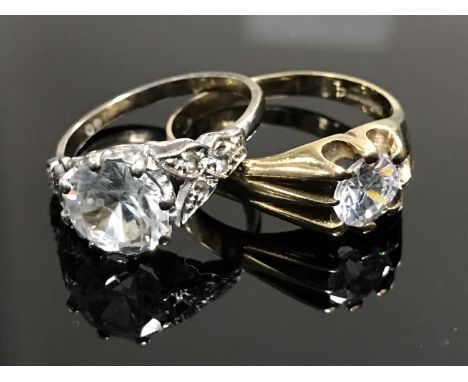 Two 9ct gold solitaire dress rings CONDITION REPORT: White gold - size K. Yellow gold - size P/Q.