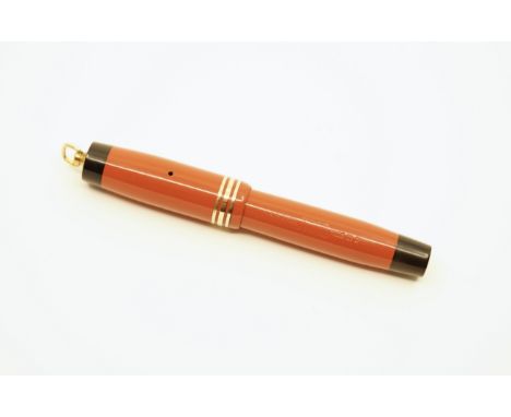 Parker Duofold vest pocket ring top pen in Red Permanite, with original sticker on butt end cap. The vest pocket model was in