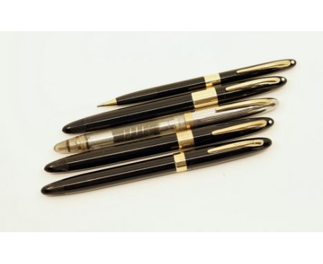 Sheaffer Snorkel lot (5). The lot consists of a demonstrator with stainless cap, black first year with solid gold Snorkel tub