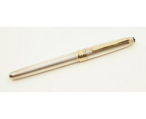 Montblanc 144 sterling silver Solitaire barleycorn fountain pen. A clean example with a fine 4810 Montblanc 14k 585 nib. Over