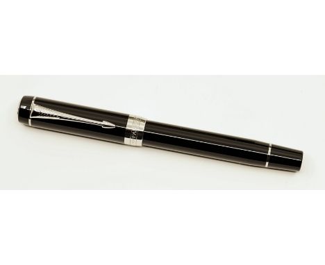 Parker Duofold rollerball in black. This is the classic version with decorative box, papers and outer box. Overall near mint,