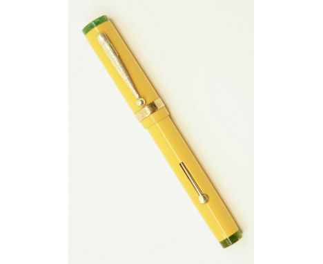 Eclipse oversized flattop pen in Mandarin Yellow with Jade ends. This Eclipse exhibits many of the features that make Eclipse