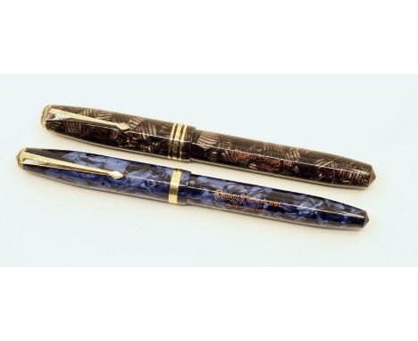 Conway Stewart 85L in marbled Ultramarine Blue and 58 model in Burgundy hatched. Both pens have clean trim and sharp imprints