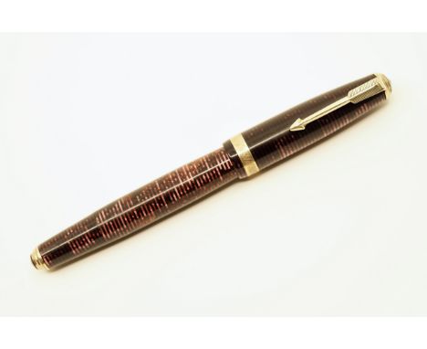 Parker Vacumatic double jewel Major in Burgundy Pearl. This clip/band combination first appeared in 1937 along with the chang