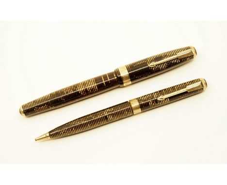 Parker Vacumatic 1st year Maxima set in Golden Pearl. This clip/band combination first appeared in 1937 along with the change