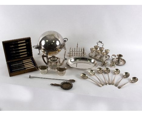 A silver plated chafing dish, crested, of globe form, a plated toast rack, tea set etc.