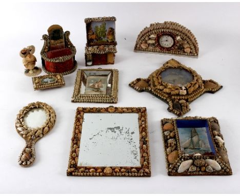A shell ware mantel clock of arch shape, 24cm wide, a hand mirror and various other pieces