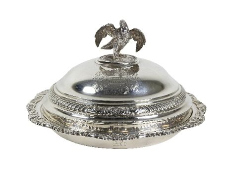 A George III/George IV silver entrée dish and cover, Richard Sibley, London 1820, with Pelican finial, armorial and crest to 