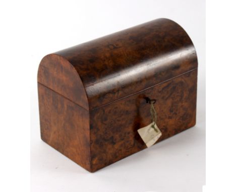 A Victorian burr walnut tea caddy with domed cover, 22cm wide