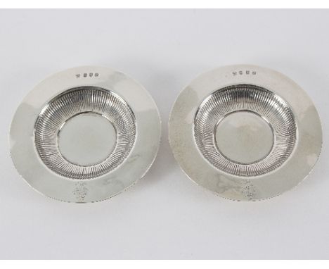 A pair of Scottish silver ash trays, R & W Sorley, Glasgow 1896, each with armorial of the Bell family, 14.5cm diameter, appr