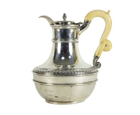 A George III silver hot-water jug, Paul Storr, London 1807, with hinged cover and gadrooned decoration to shoulder, fitted a 