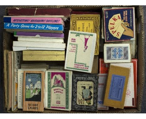 A large quantity of playing cards and card games Whist, Canasta, Bezique, party games and others