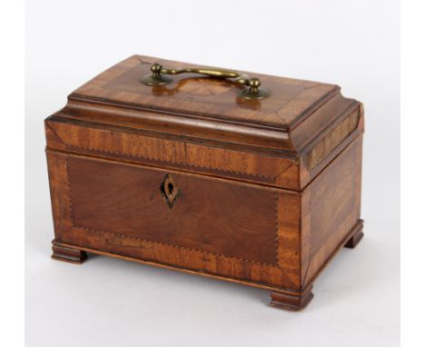A Regency inlaid tea caddy with brass swing handle, compartmental interior, 25cm wide