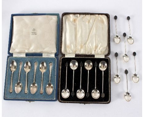 A set of six silver coffee spoons, Sheffield 1954, cased by Asprey, a set of six coffee spoons with bean finials, cased and a