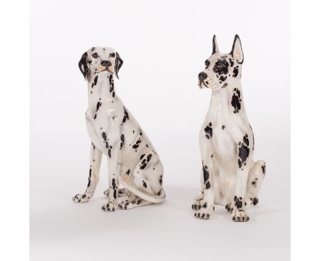 A floor standing ceramic model of a Dalmatian and another similar, largest 82cm high 
