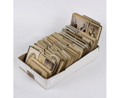 A large quantity of Victorian portrait photographs of varying sizes, the majority 10cm x 6.5cm