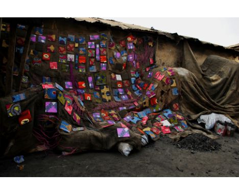 Ibrahim Mahama (Ghanaian, born 1987)Kawokudi installation, 2013 jute sacks with wax print panelsdimensions variable. Footnote