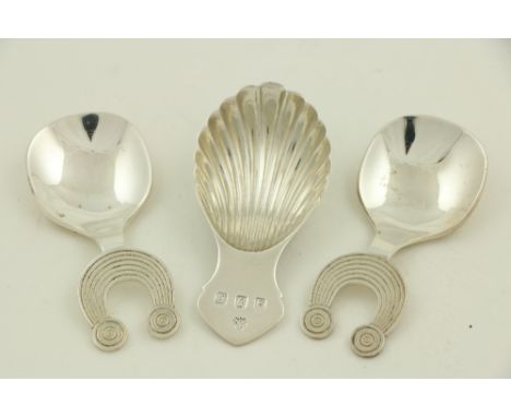 A pair of Irish silver Caddy Spoons, with EEC commemoration mark 1973; another Irish shell bowl silver Caddy Spoon, Dublin 19